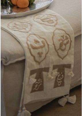 Thawb Dresses and Calligraphy Table Runner
